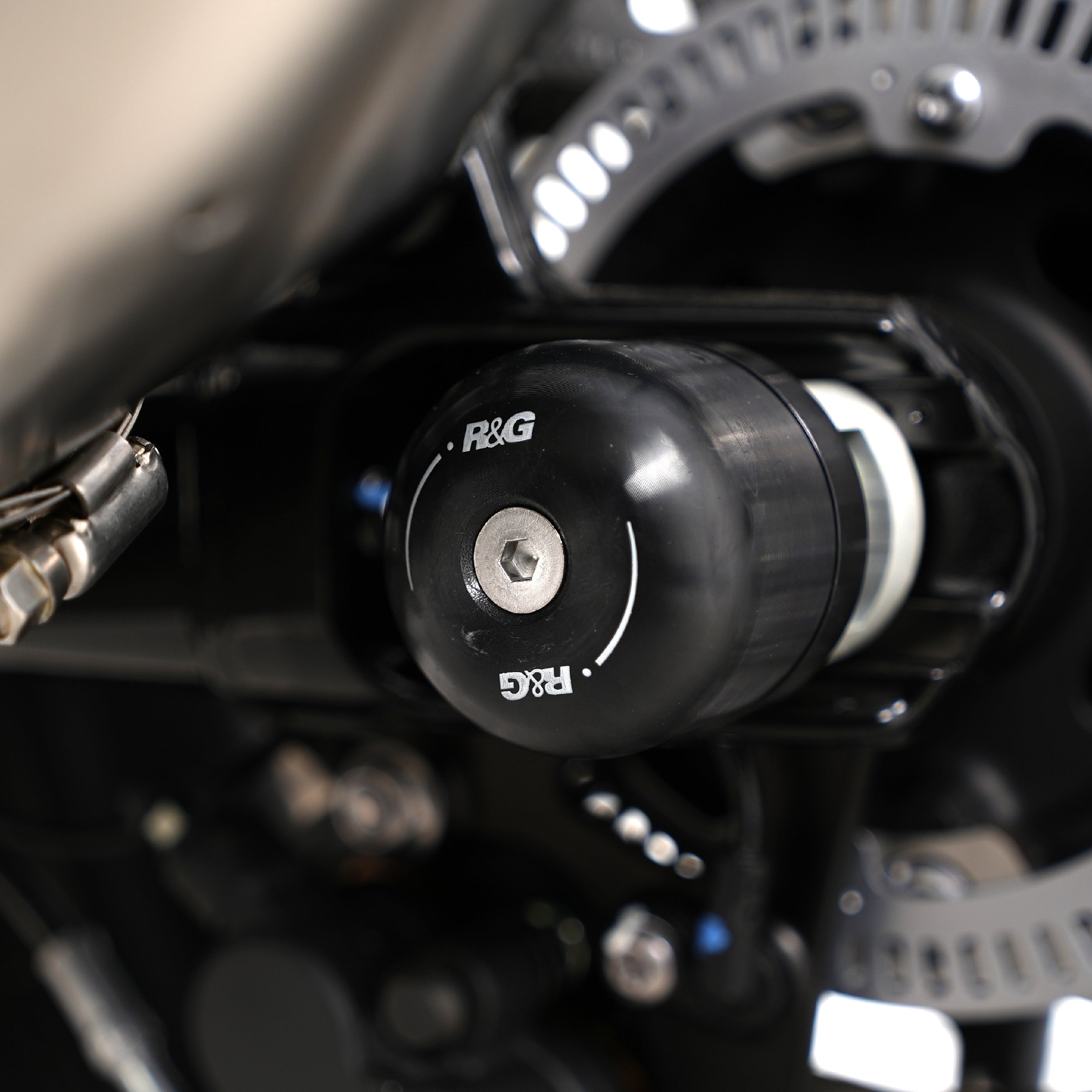 Swingarm Protectors for the Triumph Thruxton 1200 '16-, Thruxton 1200R '16-, Triumph Street Twin '16-, Speed Twin 1200 '19-'21, Speed Twin 900 '22- '24, and 5 others