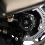 Swingarm Protectors for the Triumph Thruxton 1200 '16-, Thruxton 1200R '16-, Triumph Street Twin '16-, Speed Twin 1200 '19-'21, Speed Twin 900 '22- '24, and 5 others