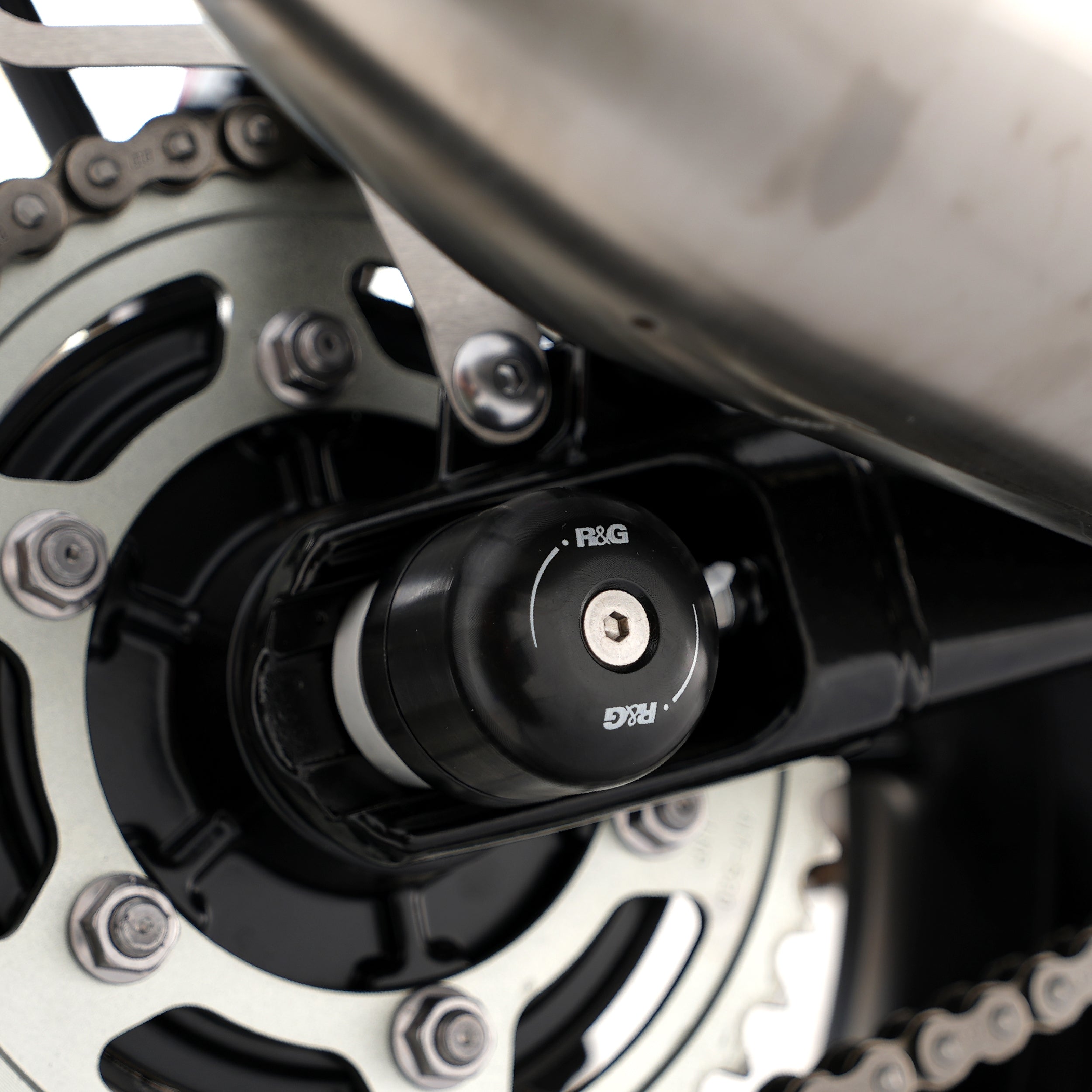 Swingarm Protectors for the Triumph Thruxton 1200 '16-, Thruxton 1200R '16-, Triumph Street Twin '16-, Speed Twin 1200 '19-'21, Speed Twin 900 '22- '24, and 5 others